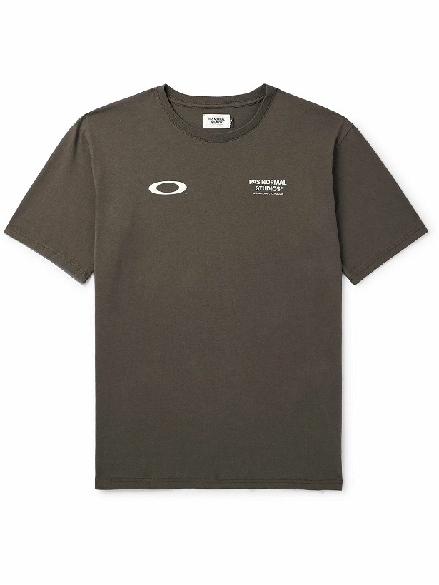 Photo: Pas Normal Studios - Oakley Off-Race Logo-Print Cotton-Jersey T-Shirt - Brown