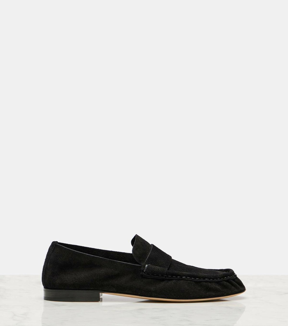 The Row Suede slip-on shoes