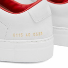 Woman by Common Projects Women's Basketball Summer Low Nubuck Sneakers in White/Red