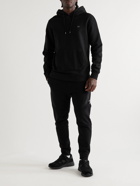 C.P. Company - Logo-Appliquéd Garment-Dyed Cotton-Jersey Hoodie - Black