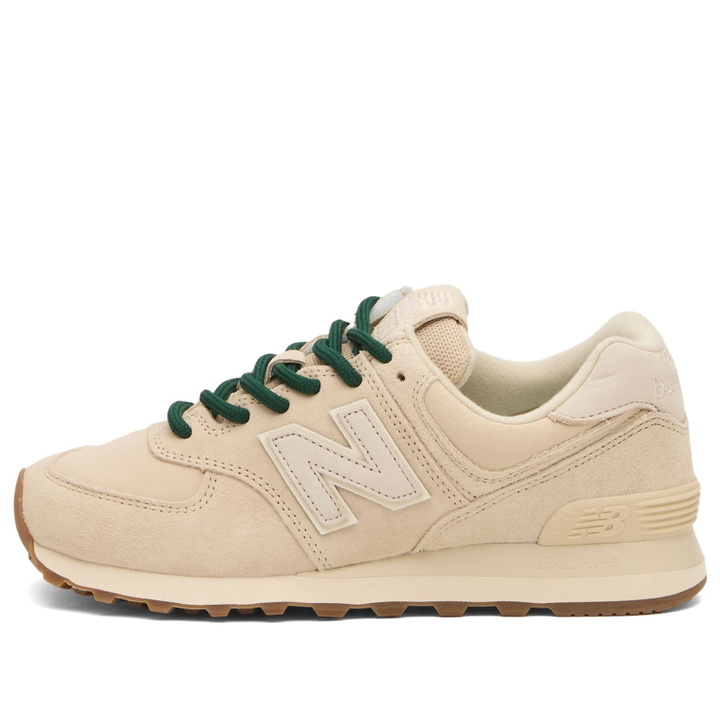 Photo: New Balance Women's 574 Sneaker in Black/Darker Sea Salt
