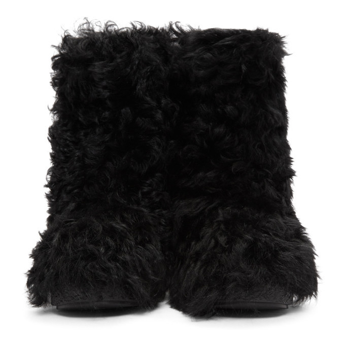 Saint laurent hotsell boots with fur