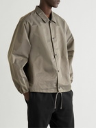 FEAR OF GOD ESSENTIALS - Logo-Flocked Shell Jacket - Brown