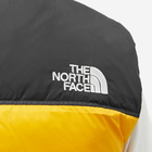 The North Face Men's 1996 Retro Nuptse Vest in Summit Gold/Tnf Black