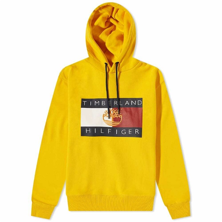 Photo: Tommy Jeans x Timberland Flag Popover Hoody in Primary Yellow