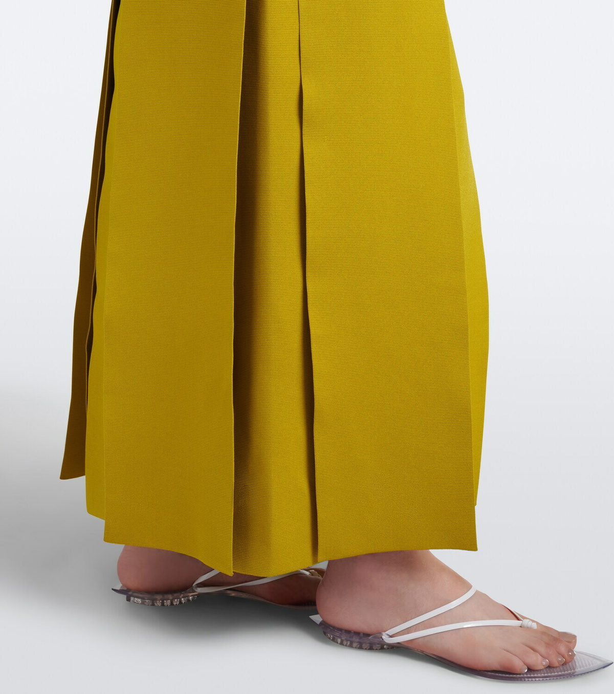 Alaïa Pleated knitted maxi dress