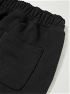 Stussy - Appliquéd Cotton-Blend Jersey Sweatpants - Black