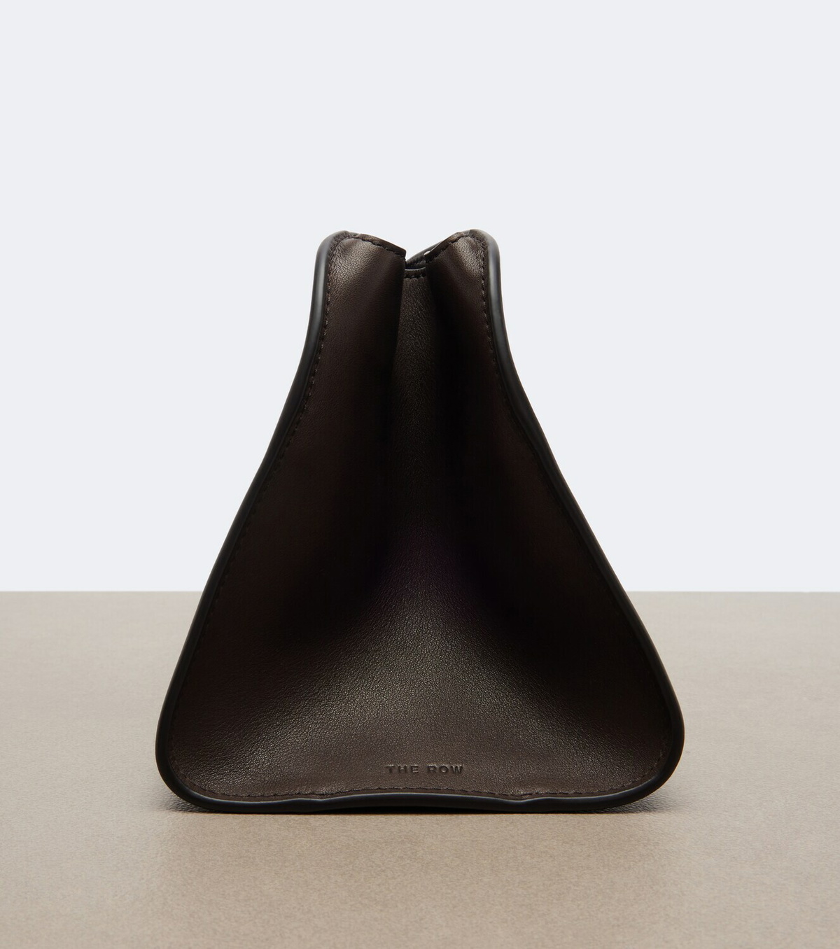 The Row Peggy leather clutch