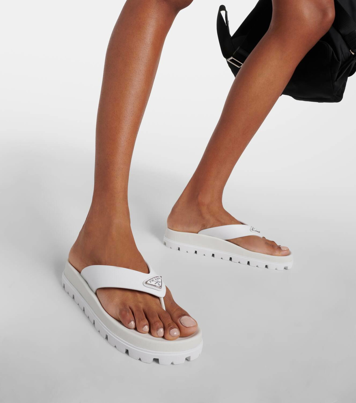 Prada Leather-trimmed thong sandals