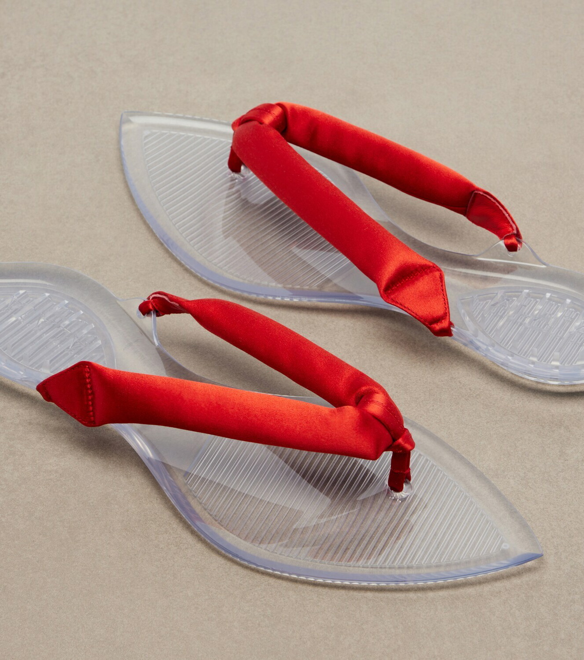 Alaïa Invisible satin thong sandals