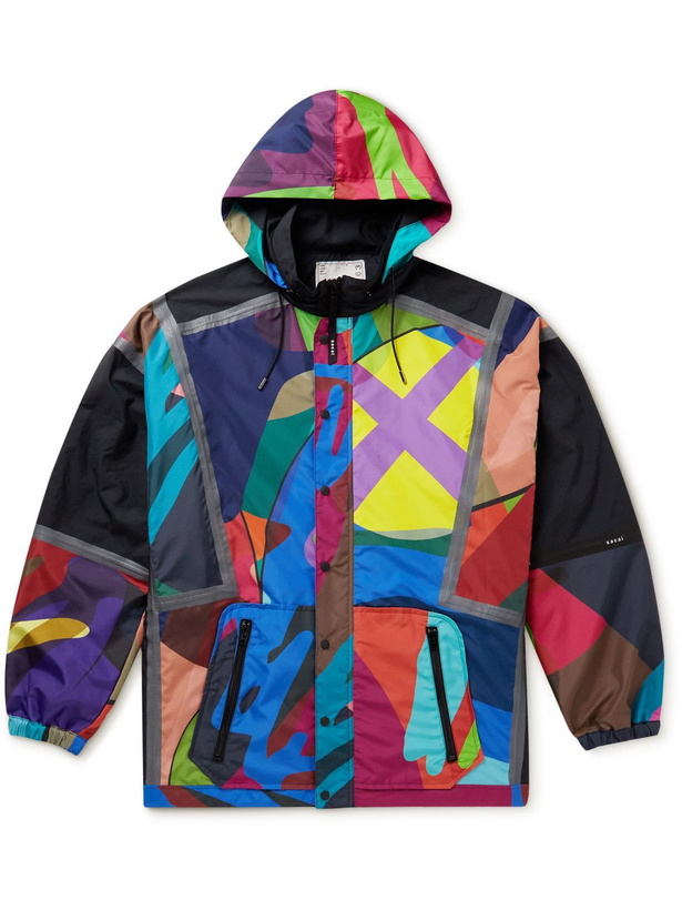 Photo: Sacai - KAWS Printed Shell Hooded Jacket - Multi