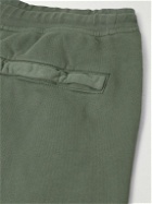 Stone Island - Tapered Logo-Appliquéd Garment-Dyed Cotton-Jersey Sweatpants - Green