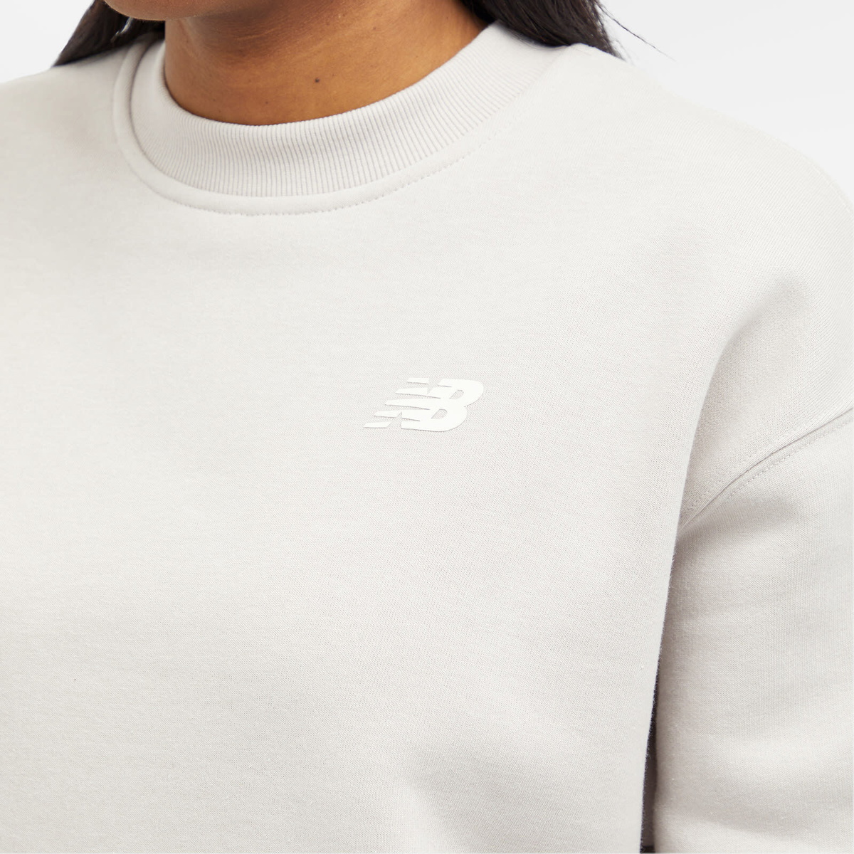 New Balance Women's Linear Heritage Brushed Back Fleece Crewneck in Moonrock
