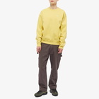 Nike Men's Solo Swoosh Fleece Crew Sweat in Saturn Gold/White