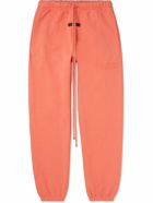 FEAR OF GOD ESSENTIALS - Tapered Logo-Appliquéd Cotton-Blend Jersey Sweatpants - Orange