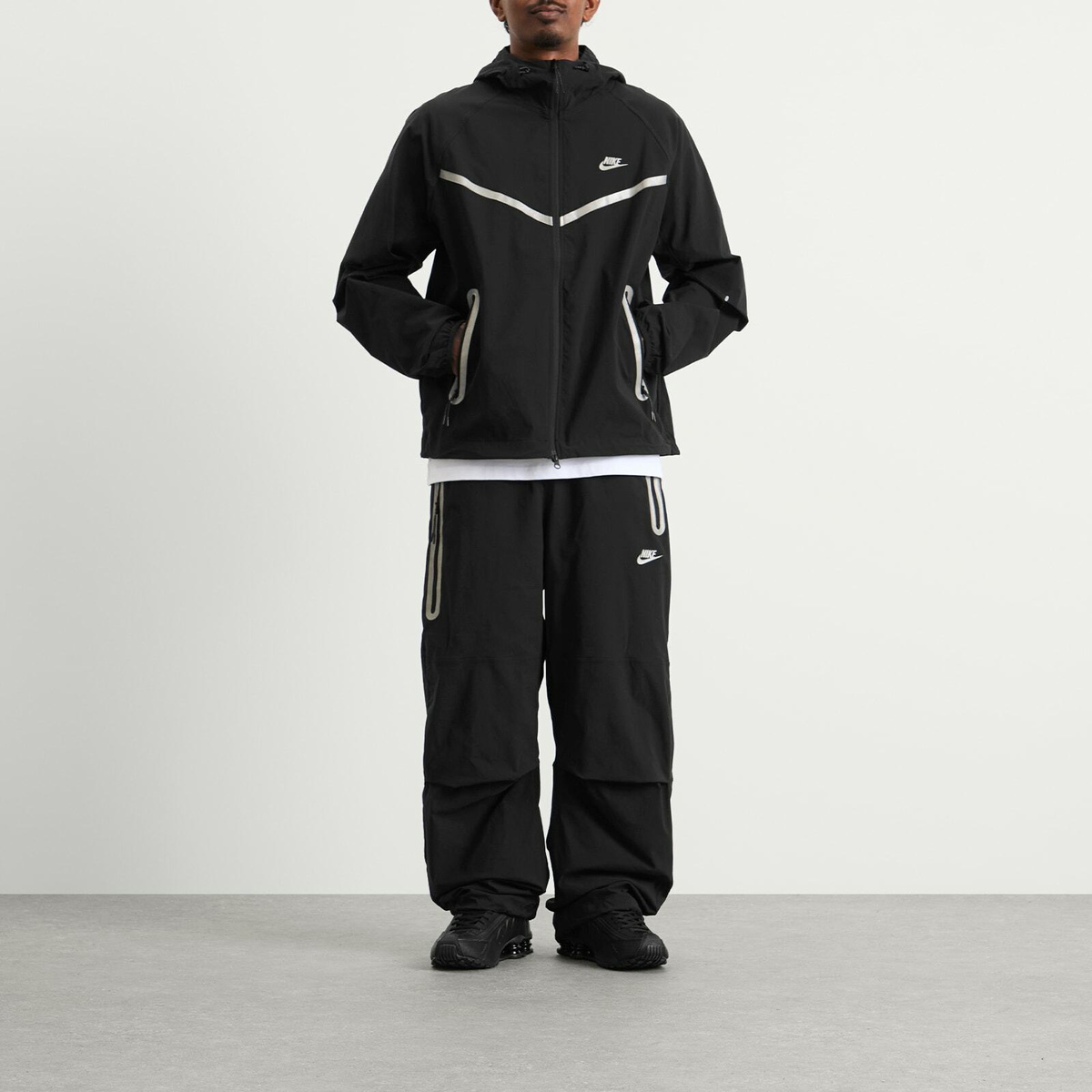 nike tech woven black