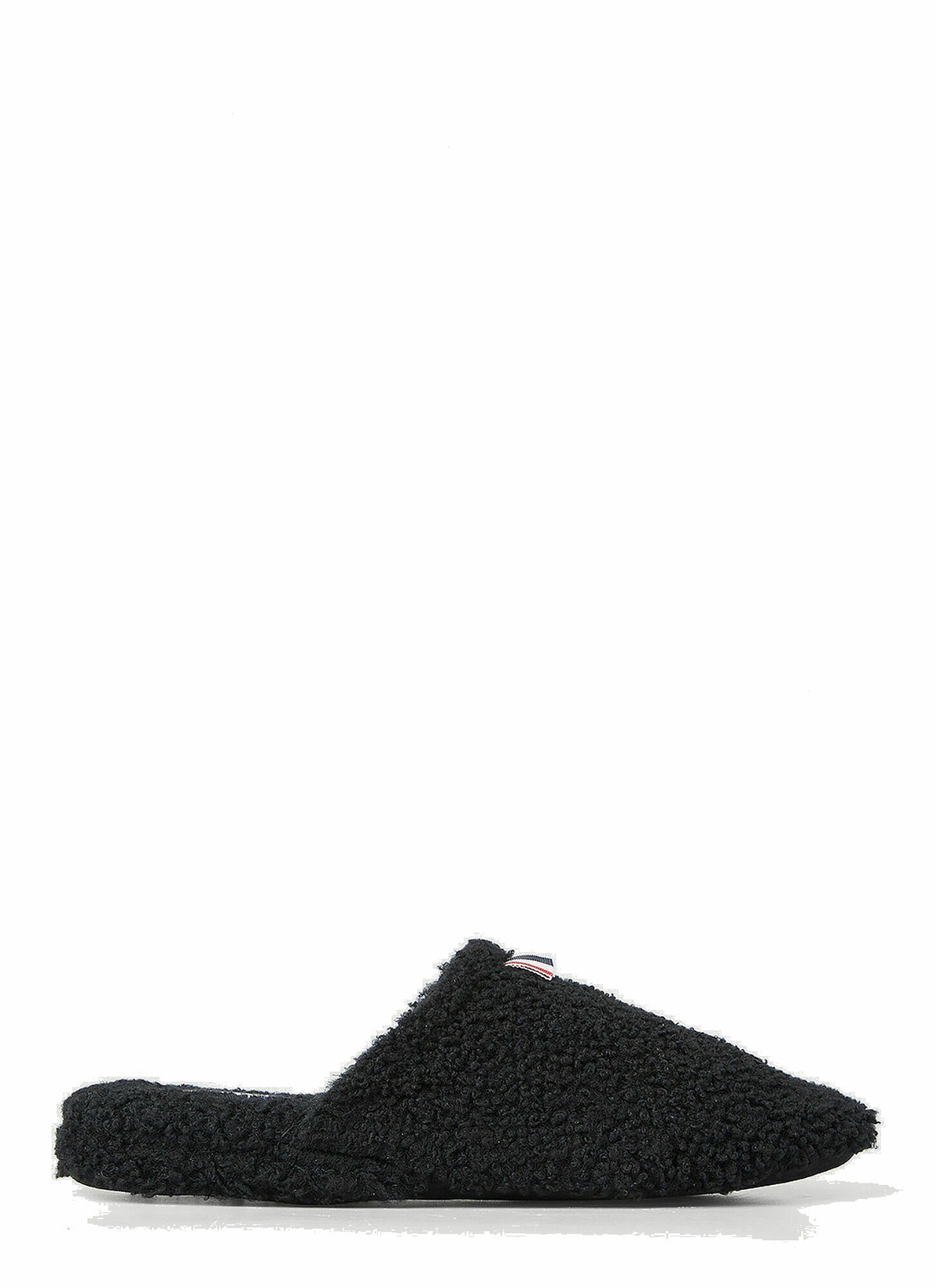 Photo: Logo Tab Shearling Slippers in Black