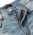 AMIRI - Skinny-Fit Appliquéd Distressed Stretch-Denim Jeans - Light blue