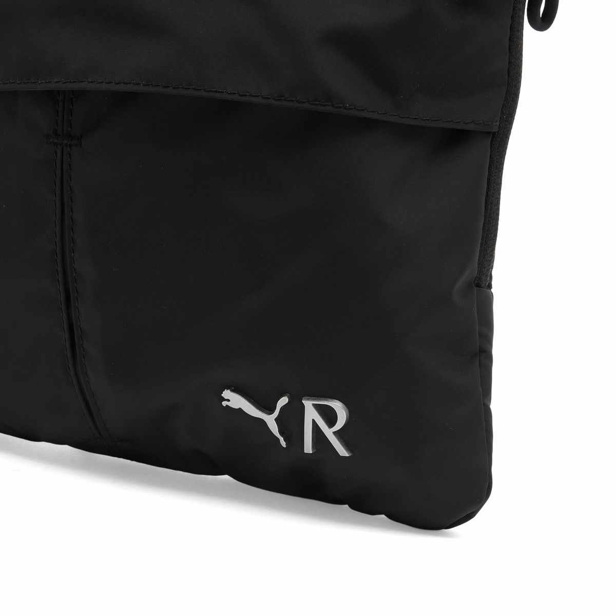 Puma x REPRESENT Sling Bag in Puma Black 