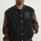 Represent Men's Vintage Varsity Jacket in Jet Black