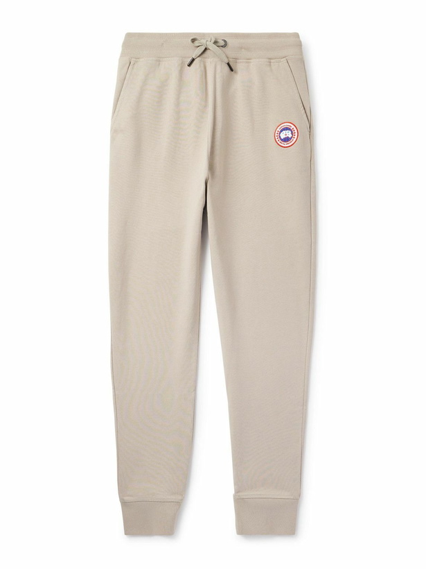 Photo: Canada Goose - Huron Tapered Logo-Appliquéd Cotton-Jersey Sweatpants - Neutrals