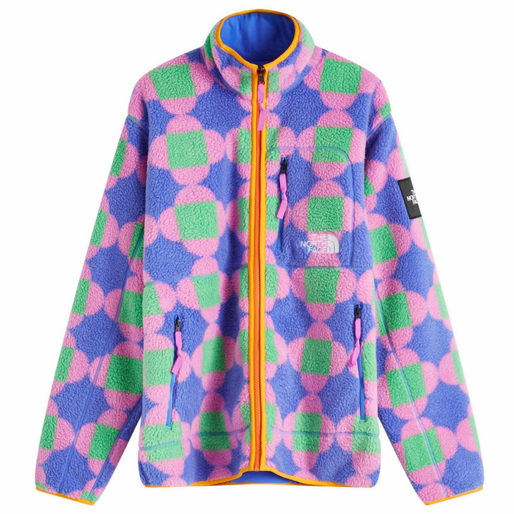 Photo: The North Face NSE x Yinka Ilori Reversible Fleece Jacket in Solar Blue Lets Blossom