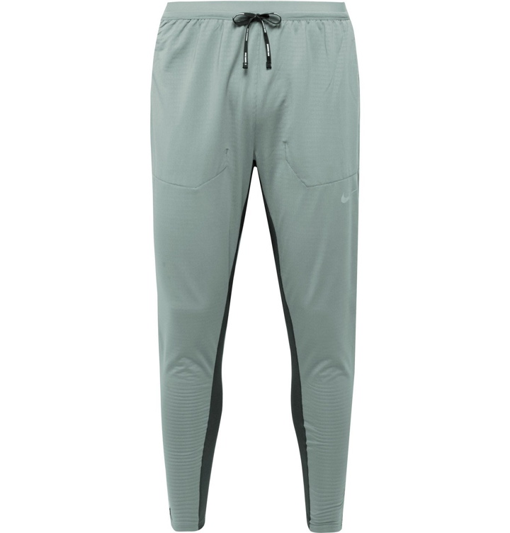 Photo: Nike Running - Phenom Elite Slim-Fit Tapered Mesh-Panelled Stretch-Jersey Sweatpants - Gray