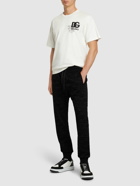 DOLCE & GABBANA - Flocked Logo Cotton Jersey Sweatpants