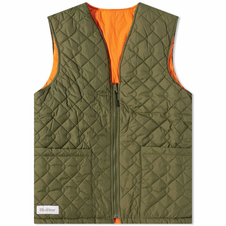 Photo: Butter Goods Men's Chain Link Reversible Puffer Vest in Army/Orange
