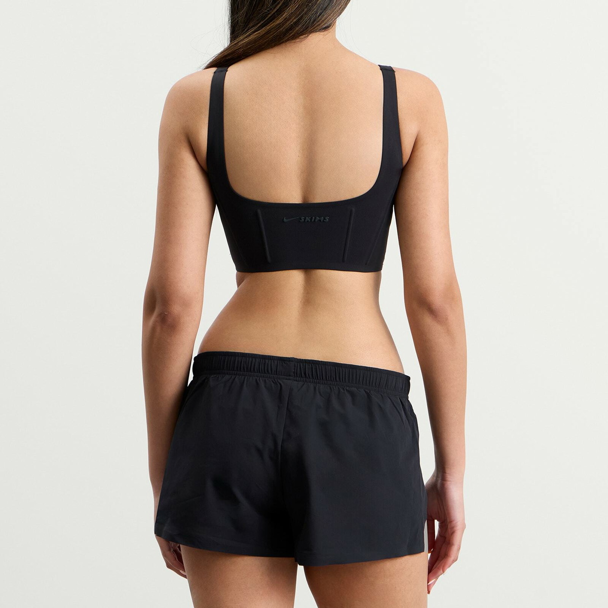 Nike Women's x SKIMS Matte Corset Longline Bra in Obsidian