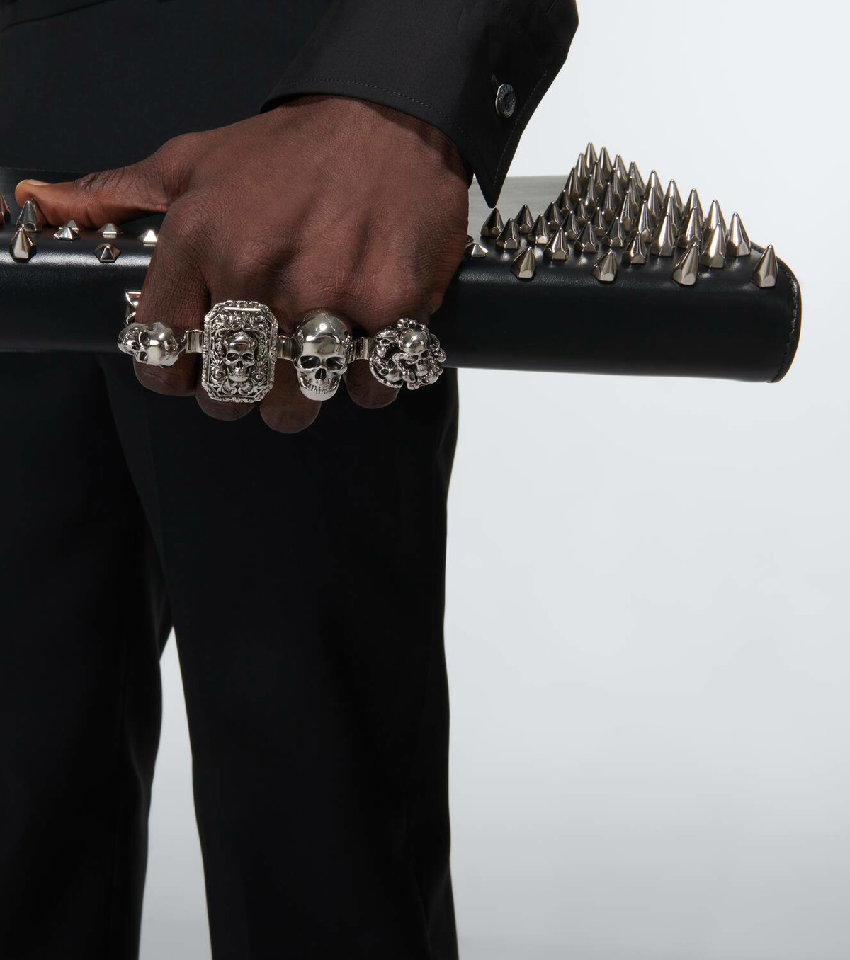 McQueen Four-Ring embellished leather clutch