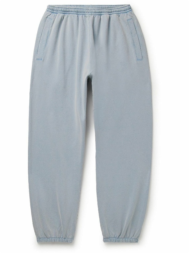 Photo: Acne Studios - Tapered Logo-Appliquéd Cotton-Jersey Sweatpants - Blue