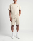 Puma Downtown Graphic Tee Mens T-shirt in Beige