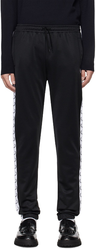 Photo: Fred Perry Black Taped Track Pants