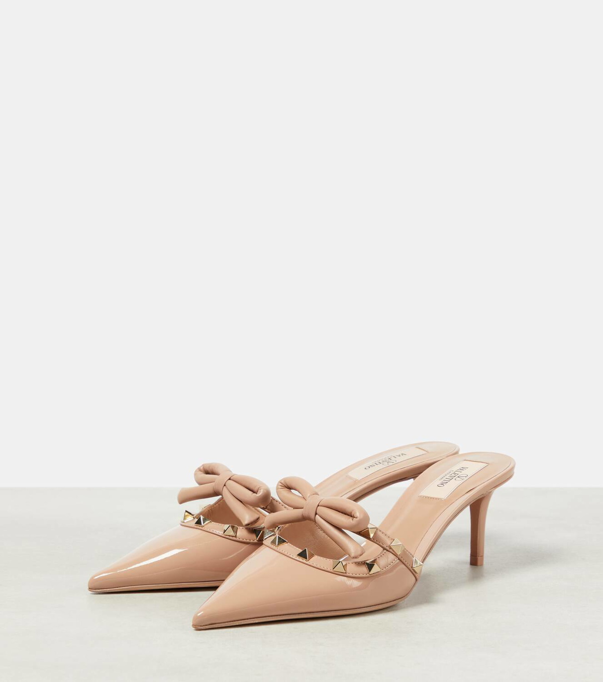 Valentino Garavani Rockstud bow-detail patent leather mules