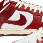 Nike Dunk Low Prm W Sneakers in White/Team Red/Coconut Milk