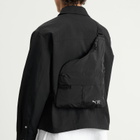 Puma x REPRESENT Sling Bag in Puma Black 