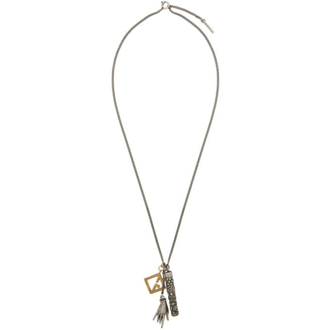 Photo: Givenchy Silver and Gold Talisman Multicharm Necklace