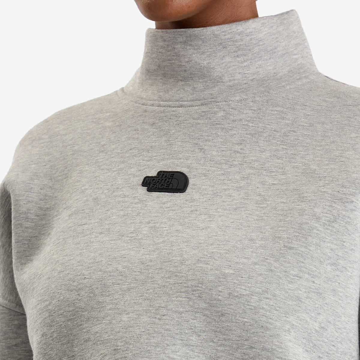The North Face Women's Mock Neck Relaxed Sweatshirt in Metallic Silver Heather