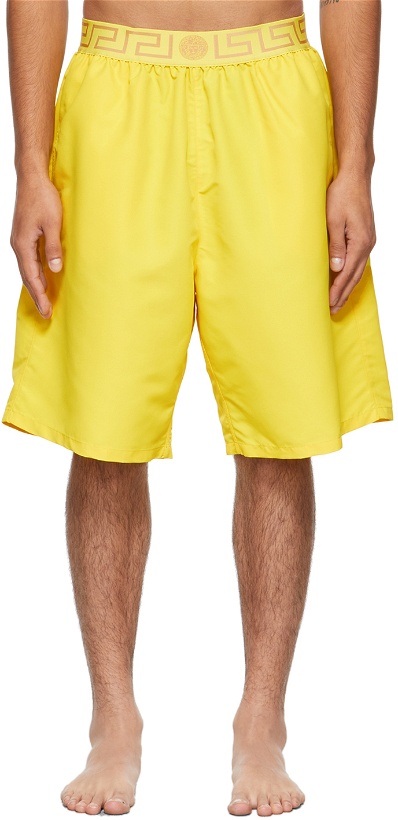 Photo: Versace Underwear Yellow Greca Swim Shorts