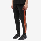 Adidas Men's Superstar Track Pant in Black/Orange