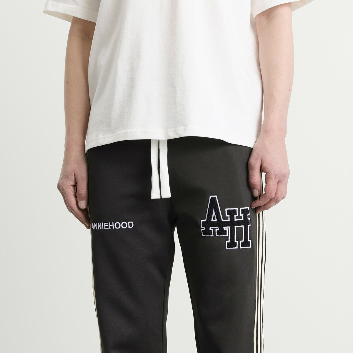 ANNIE HOOD Men's College Track Pants in Black