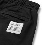 Heron Preston - Tapered Printed Organic Loopback Cotton-Jersey Drawstring Track Pants - Black