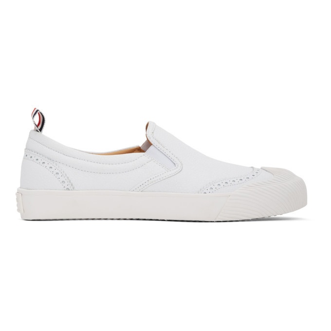 Photo: Thom Browne White Vulcanized Brogued Slip-On Sneakers