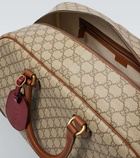 Gucci GG Canvas Medium leather-trimmed duffel bag