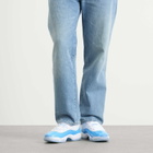 Air Jordan Men's 11 Retro Low Sneaker in White/University Blue