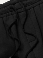 HAYDENSHAPES - Arsham Stampd Eroded Appliquéd Embroidered Cotton-Jersey Sweatpants - Black