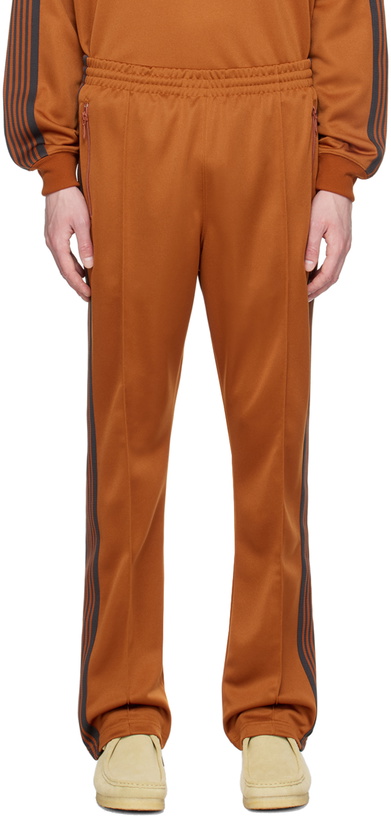 Photo: NEEDLES Orange Narrow Track Pants