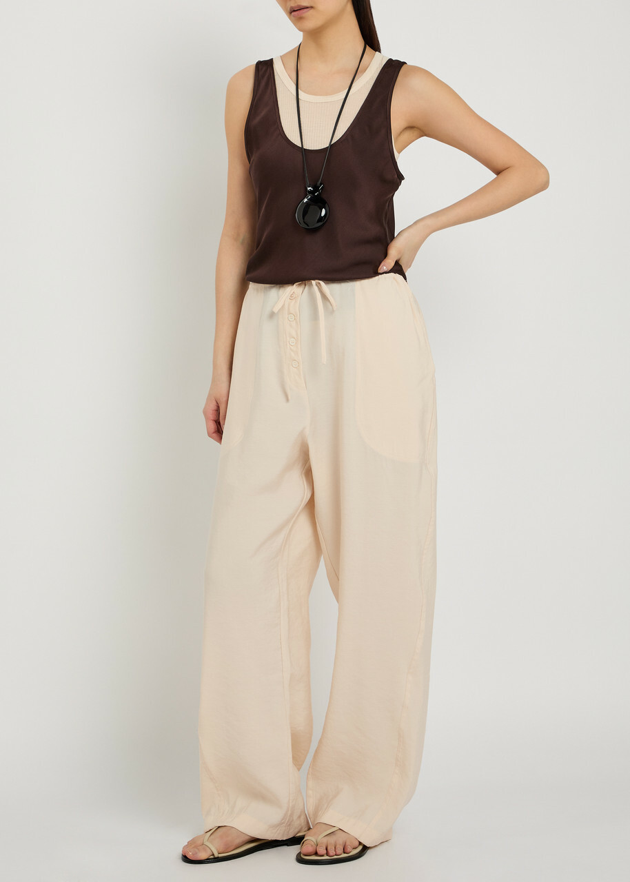 Studio Nicholson Drawstring Straight-leg Modal-blend Trousers Beige