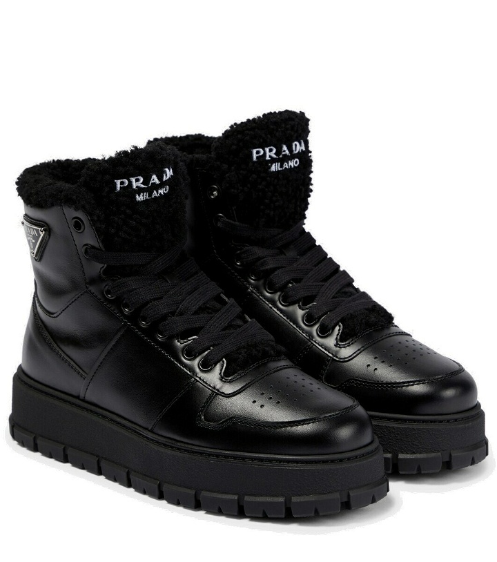 Photo: Prada Shearling-trimmed leather ankle boots